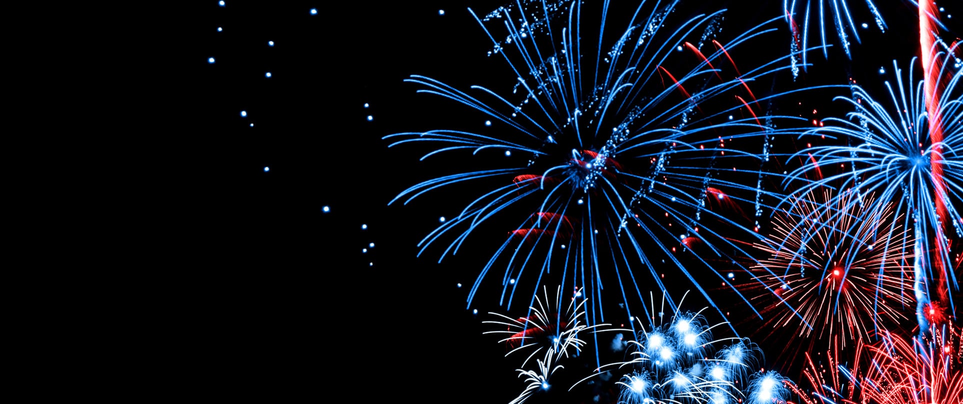 blue and red fireworks exploding